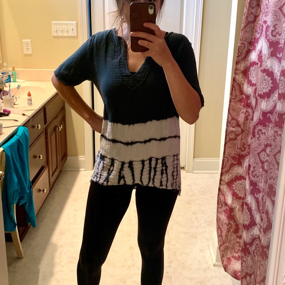 Distressed tie dye v-neck shirt.
